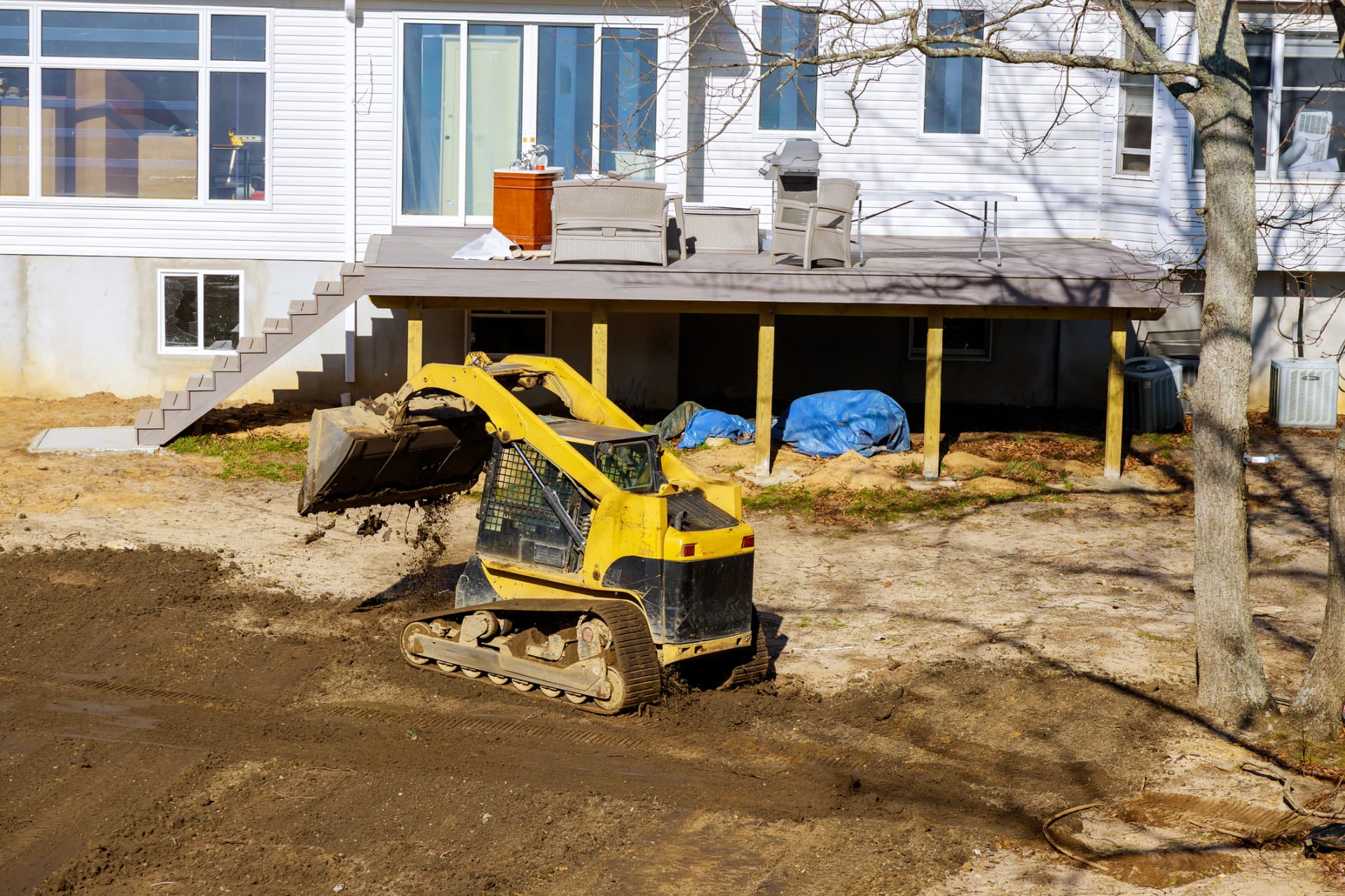Backyard deck addition and site grading in Surfside, FL