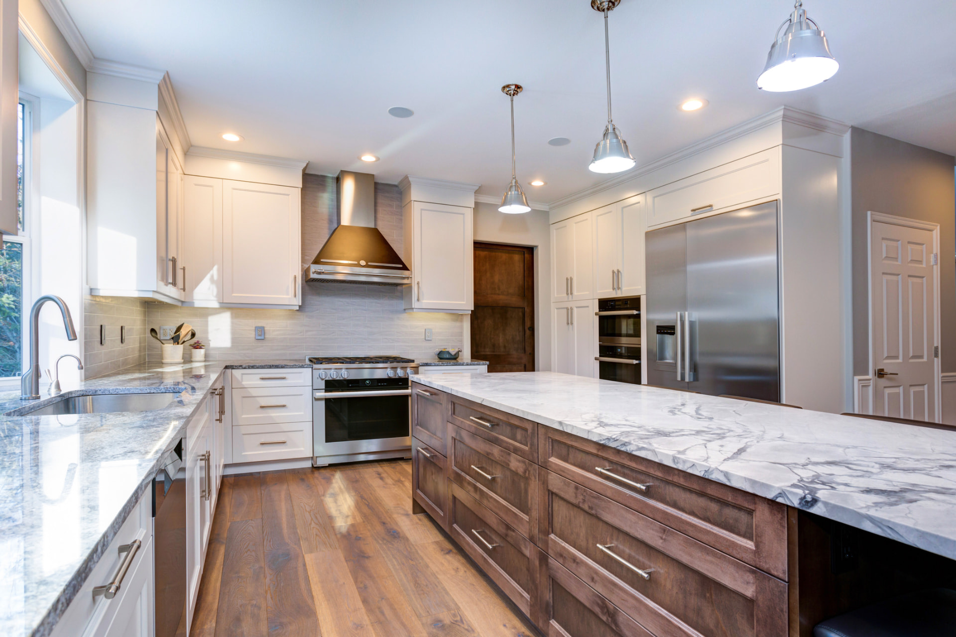 Transitional kitchen remodel with marble island in Las Olas, Fort Lauderdale, FL