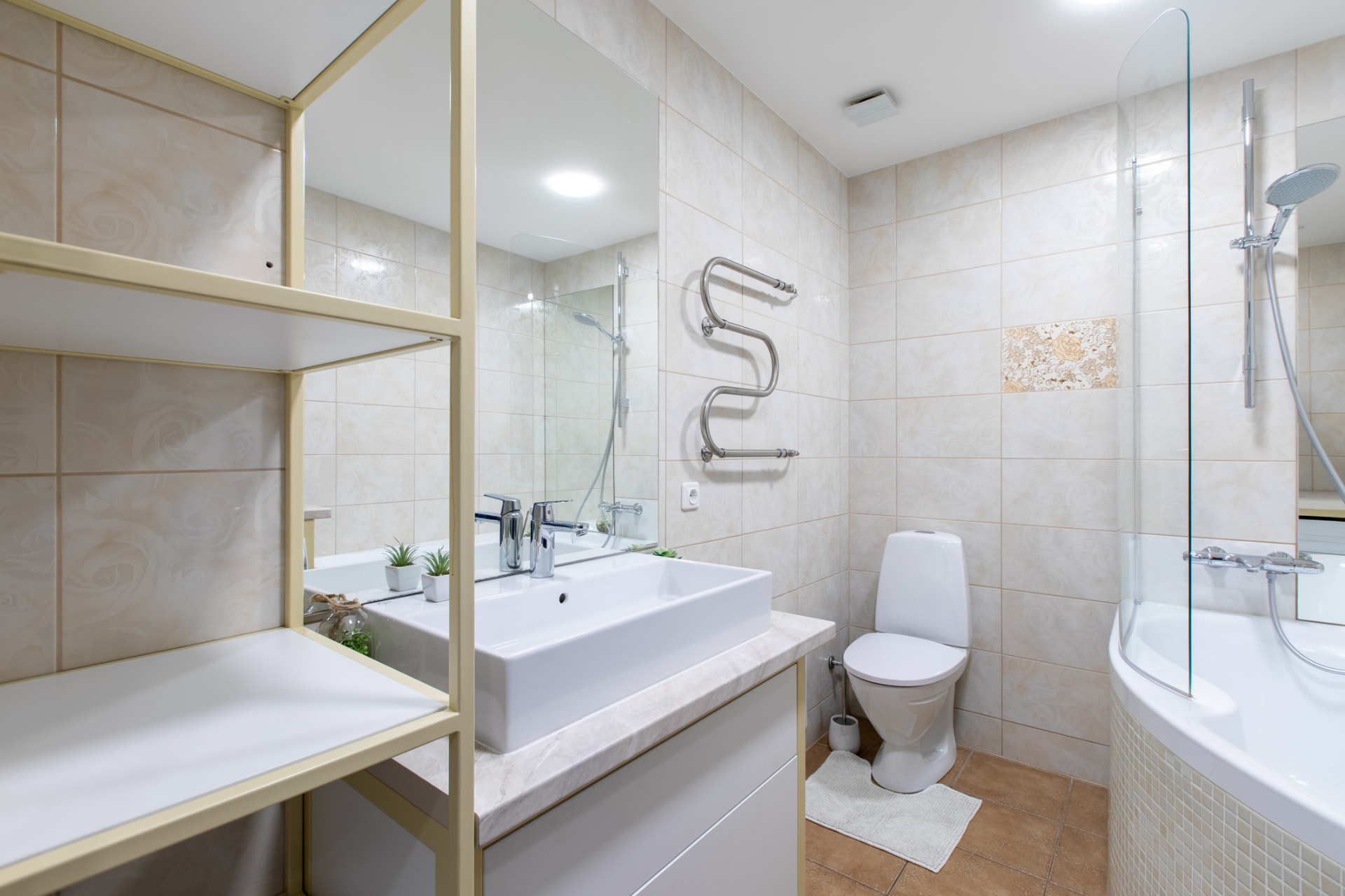 Compact guest bathroom remodel with vessel sink in Bal Harbour, FL