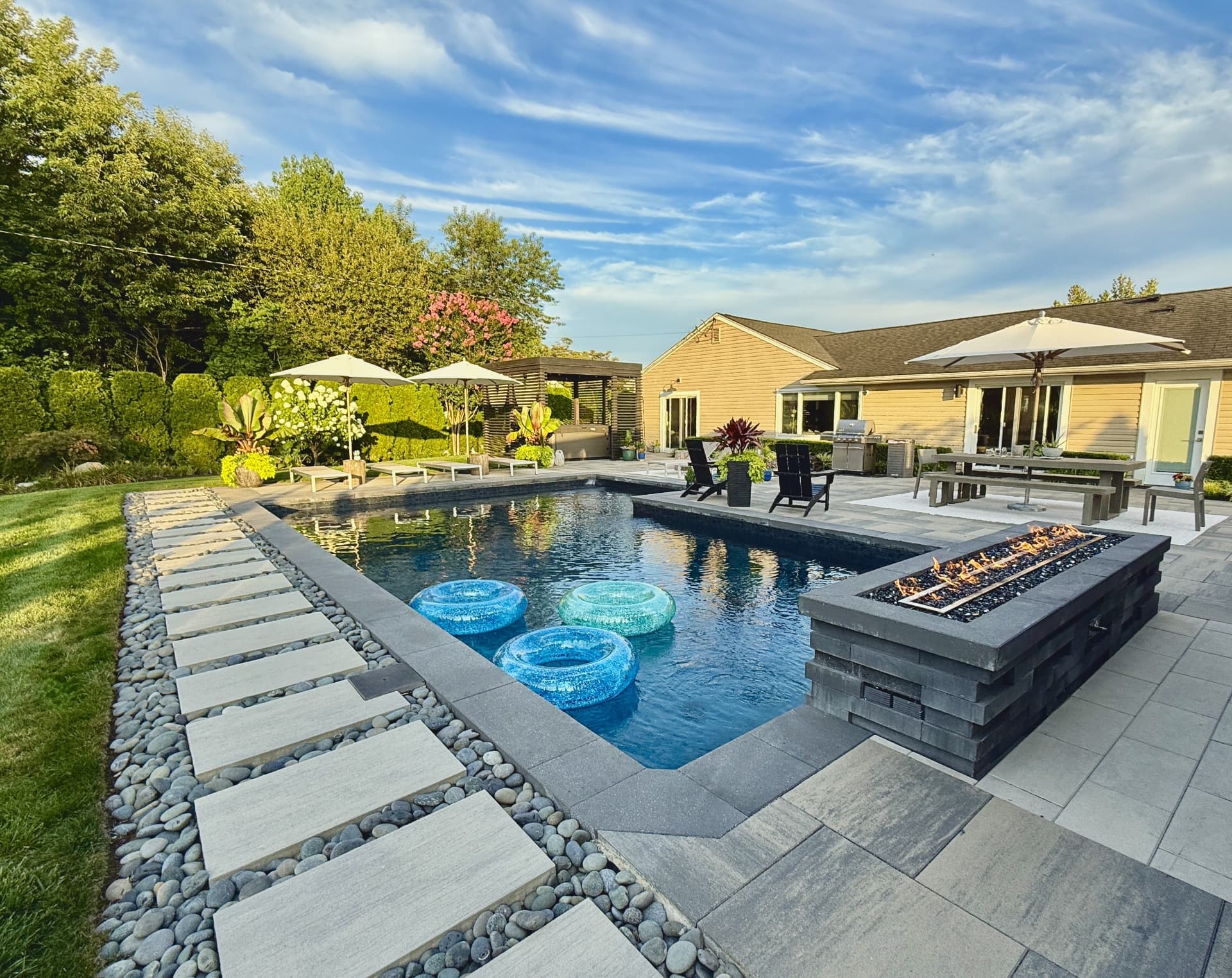 Backyard pool, paver patio, and fire pit renovation in Boca Raton, FL