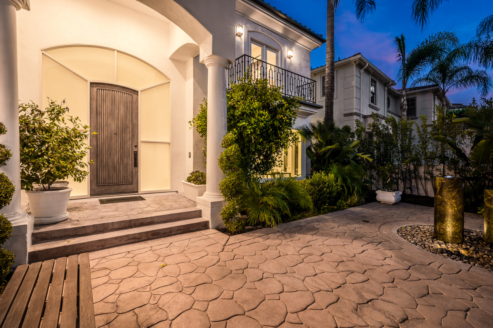 Front entry remodel with stamped concrete driveway in Miami, FL