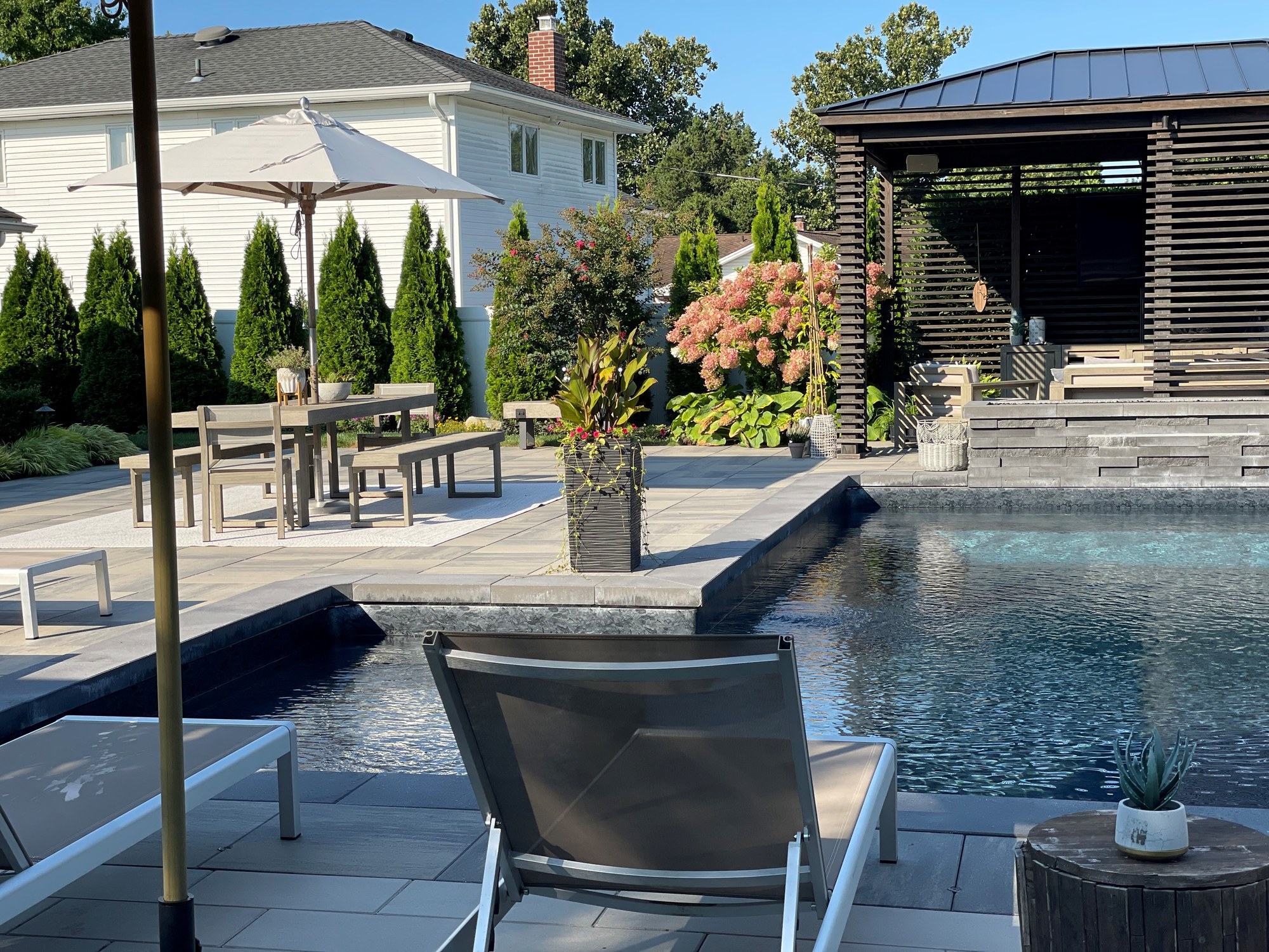 Modern pool deck and outdoor living space in Boca Raton, FL